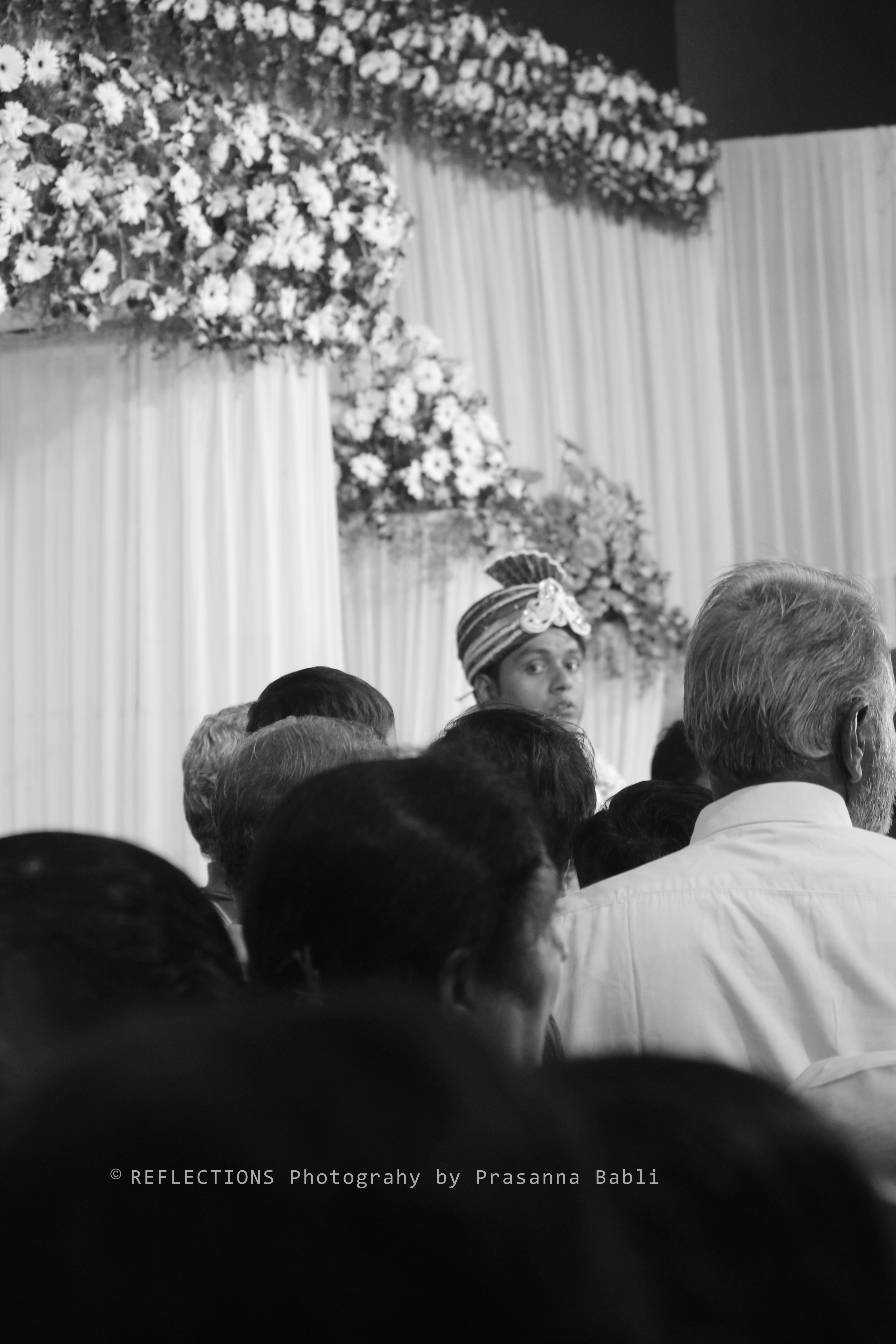 The long wait to wish the couple a very happy married life on the podium.